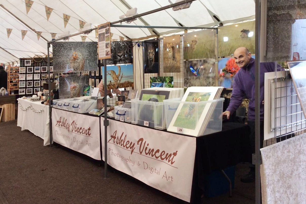 wildlife photographer Ashley Vincent at his event stand