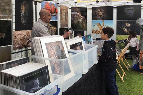 ashley vincent engaging with customers at the Brighton Thai Festival