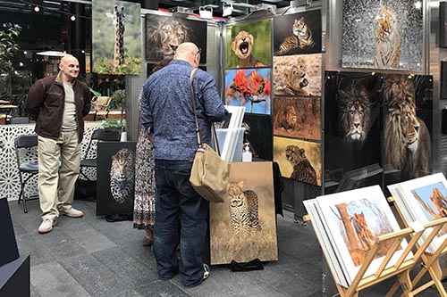 ashley Vincent watching over customers at the Spitalfileds Arts Market in London