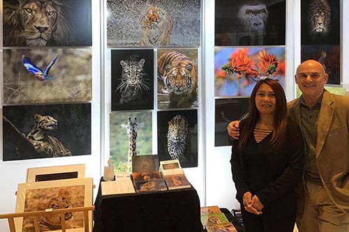 Pupe' and Ashley by their display stand at the Parallax Art Fair in Kensington Town Hall