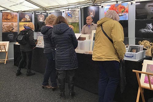 ashley vincent engaging with customers at the RHS Hyde Hall Christmas Gift and Craft Fair