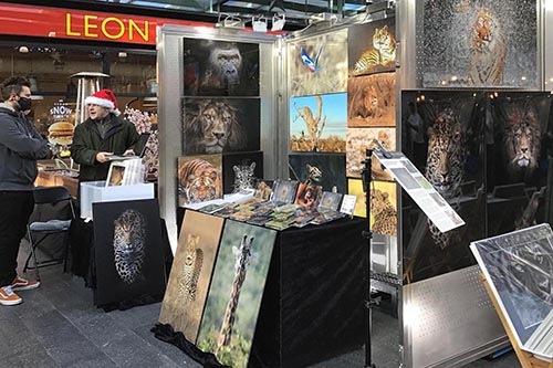 Ashley Vincent engaging with customer at the Spitalfileds Arts Market in London