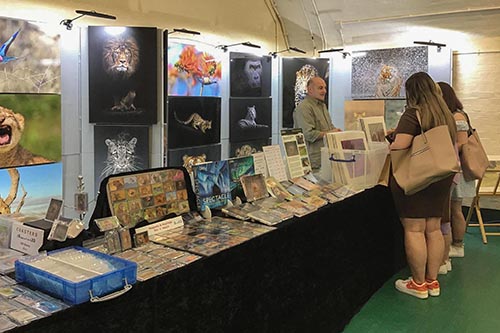 Ashley Vincent engaging with customers at the 2022 Fort Purbrook Contemporary Craft Show