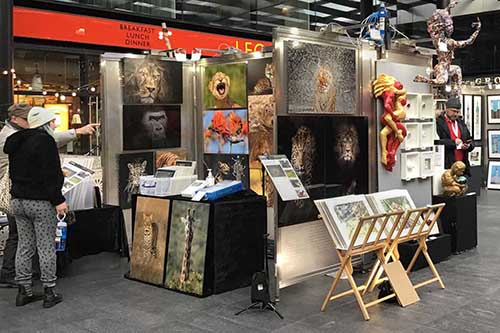 Ashley Vincent engaging with customer at the April Spitalfileds Arts Market in London