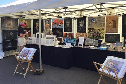 Ashley Vincent engaging with customers at the 2022 Broadstairs FreeWheelin FEASTival