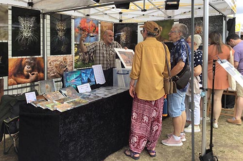 Ashley Vincent engaging with customers at the 2022 Brighton Thai Festival