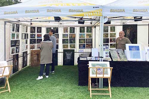 Ashley Vincent with customers at the 2023 Norwich Thai Festival