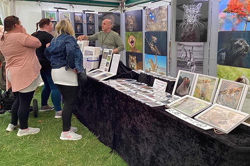 Ashley Vincent with customers at the 2023 Henley Country Craft Show