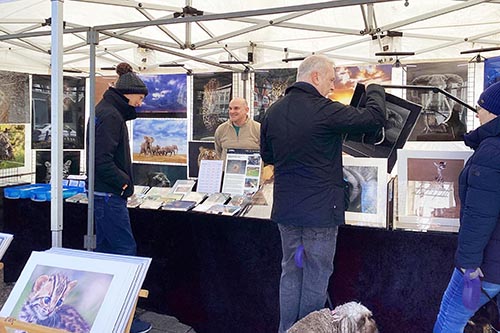Ashley Vincent engaging with customers at the 2024 Eastbourne Easter Market