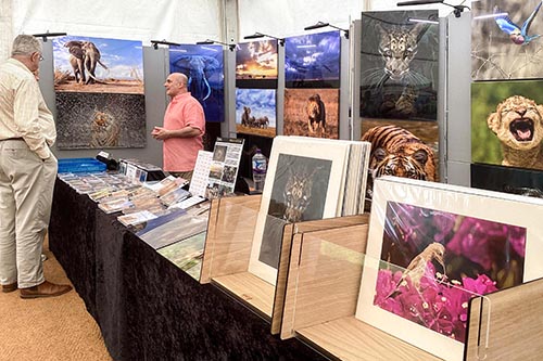 Ashley Vincent engaging with customers at the 2024 Living Crafts show at Hatfield House