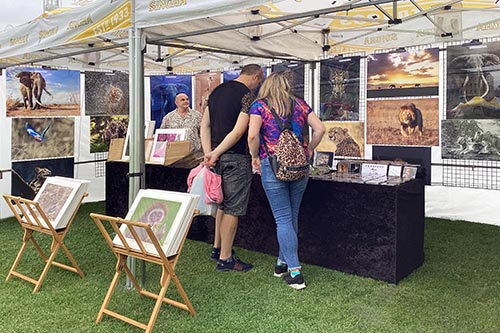 Ashley Vincent engaging with customers at the 2024 Cambridge Thai Festival