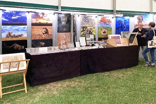 Ashley Vincent engaging with customer at the 2024 Henley County Craft Show