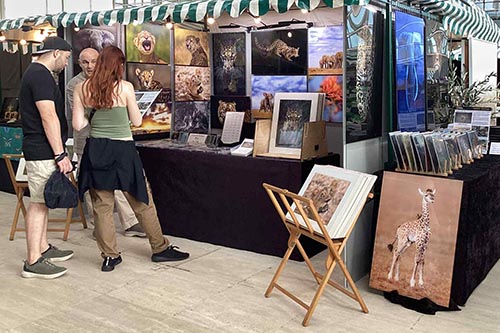 Ashley Vincent with customers at the 2025 Milton Keynes Handmade & Vintage Autumn Show
